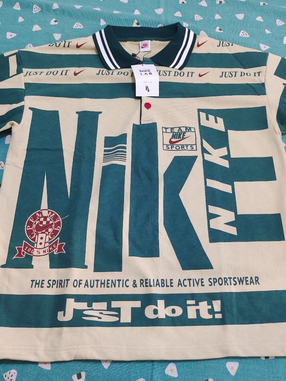 Nike Cream & Teal Striped Polo Shirt with All-Over Print